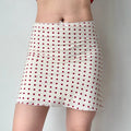 Red polka dot mini skirt, full front view