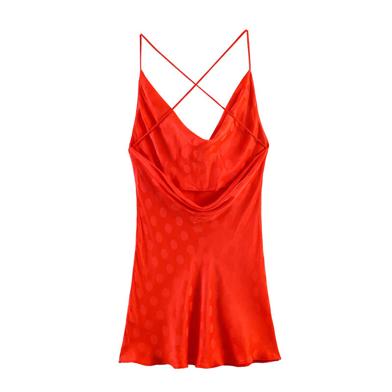 Hanger back view of red satin dress highlighting the crisscross strap detail and fitted waist