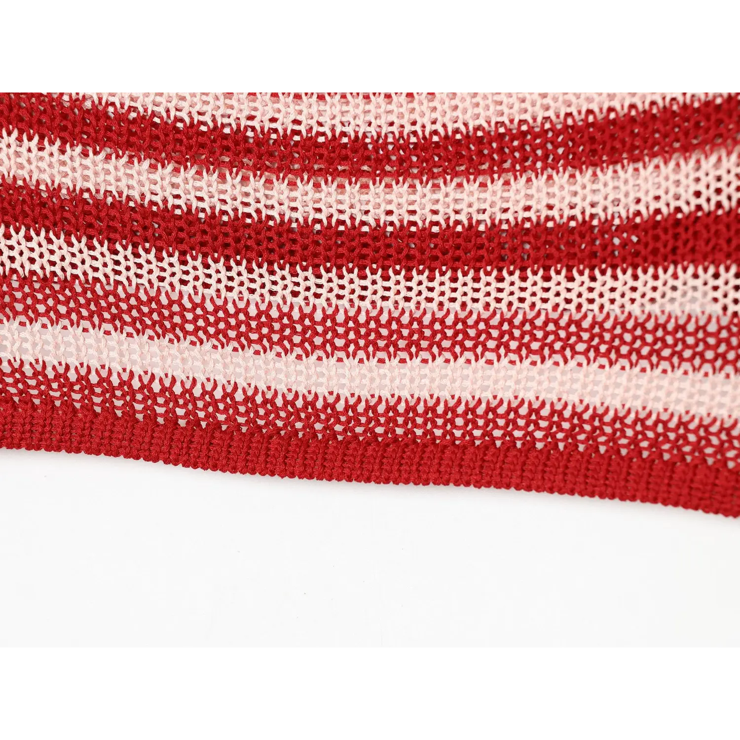 Bottom hem full texture shot, alternating red and pale pink stripe hollow mesh knitting