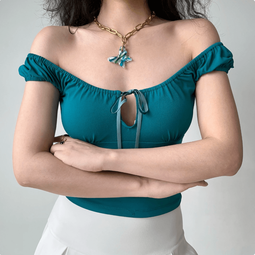 Front view teal off shoulder square neck tie keyhole crop top, puff short sleeve ruched bust slim elegant casual blouse