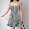 Black and white tweed cami dress with buttons and pleated hem