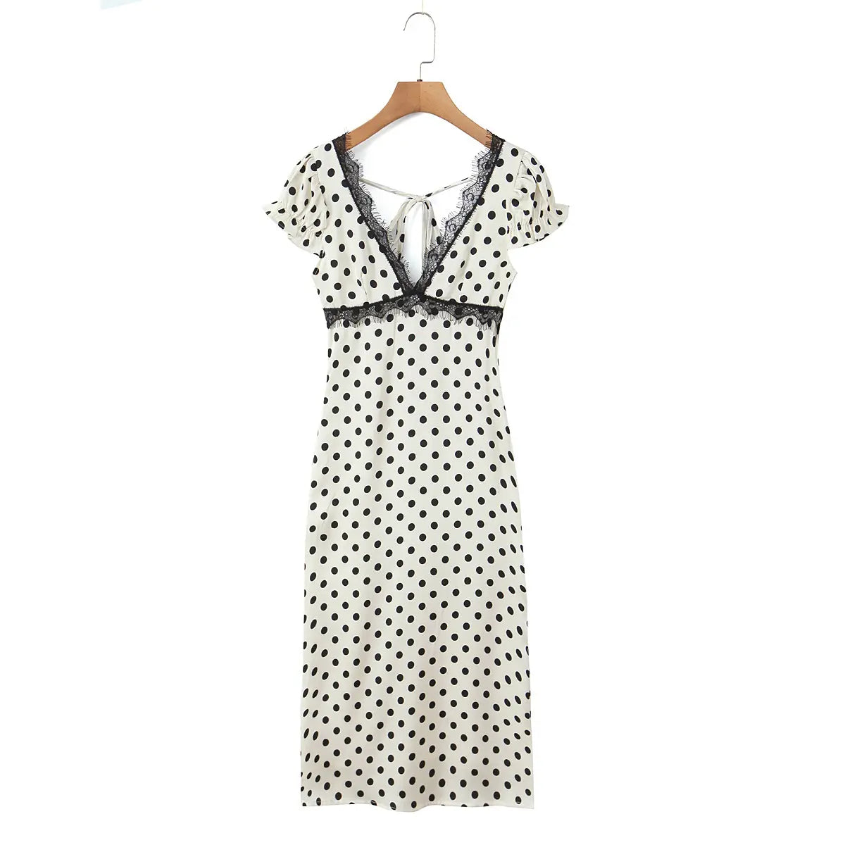 White and black polka dot lace-trim maxi dress, front view on white background