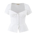 White corset-style short-sleeve top, front view on hanger, white background