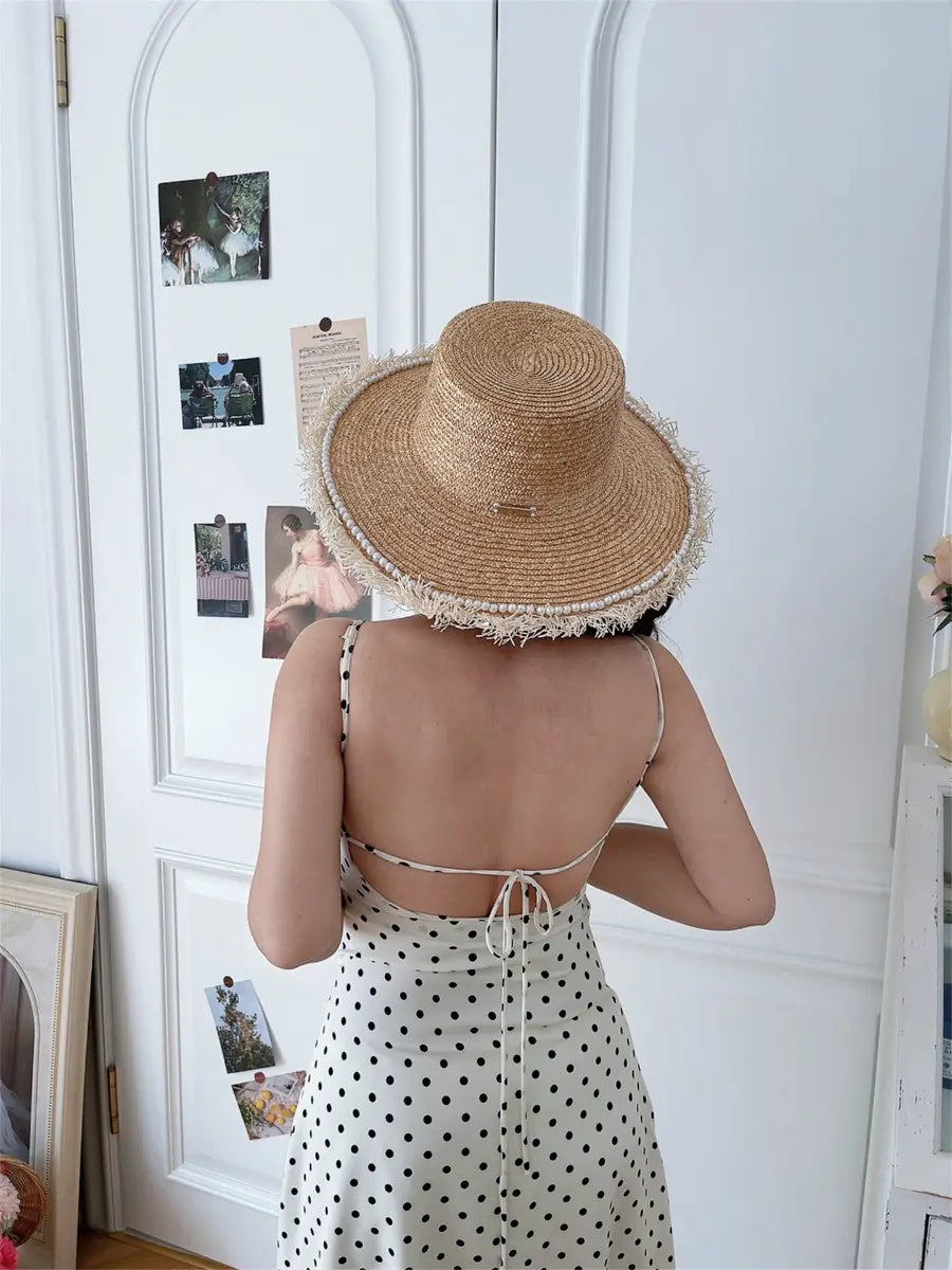 Back-side view of white crochet lace-trim maxi dress on model