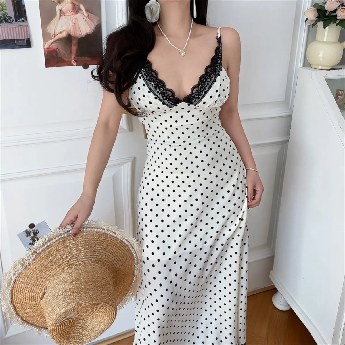 Front-side view of white crochet lace-trim maxi dress on model