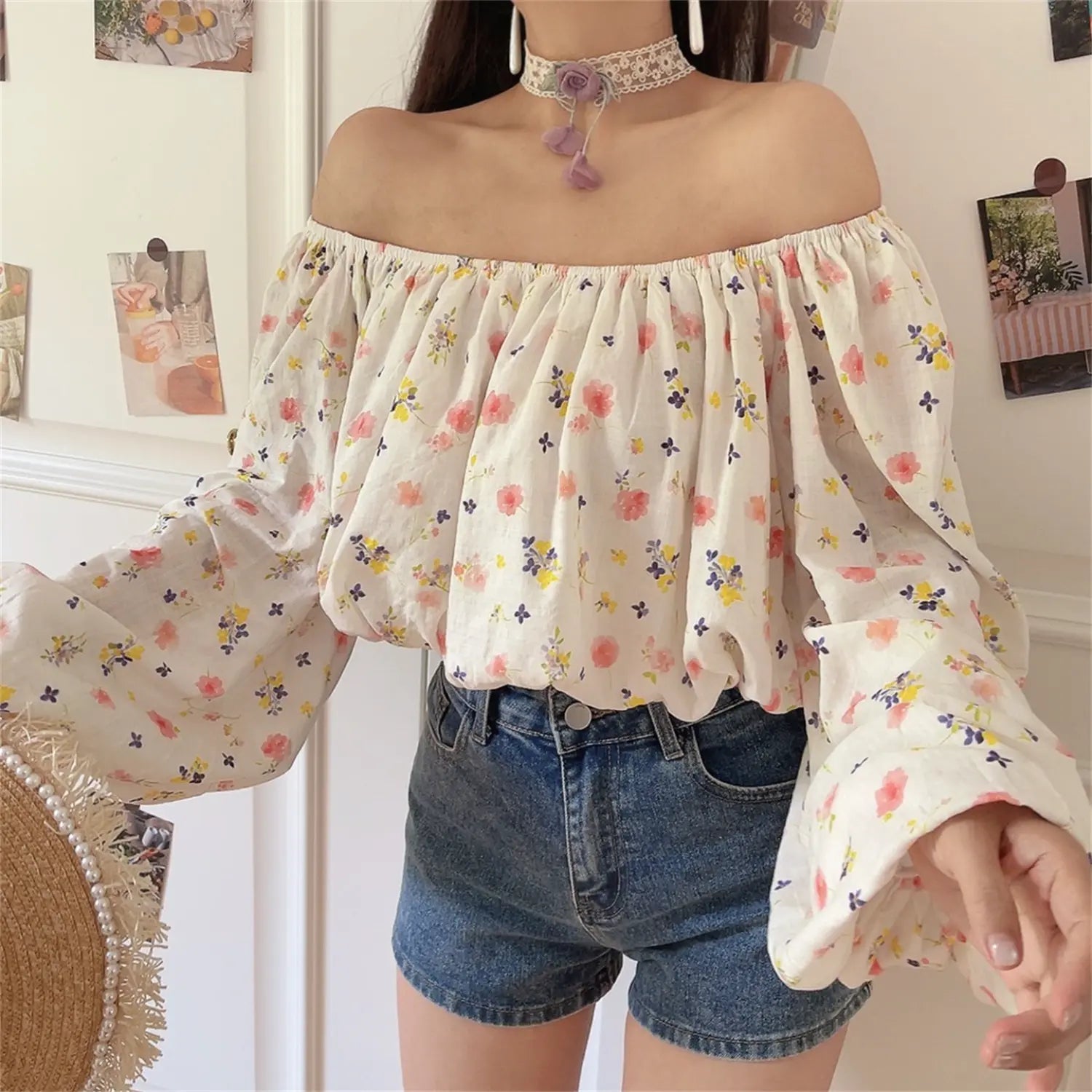 Front real shot of white base colorful small floral off shoulder long sleeve blouse, elastic ruched boat neck, bubble flare cuffs, cropped loose fit