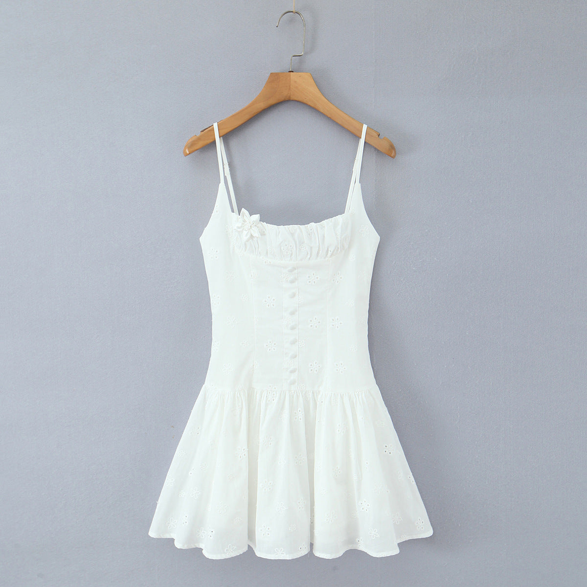 Front hanging view white embroidered floral spaghetti strap A-line mini dress, romantic women's casual wear