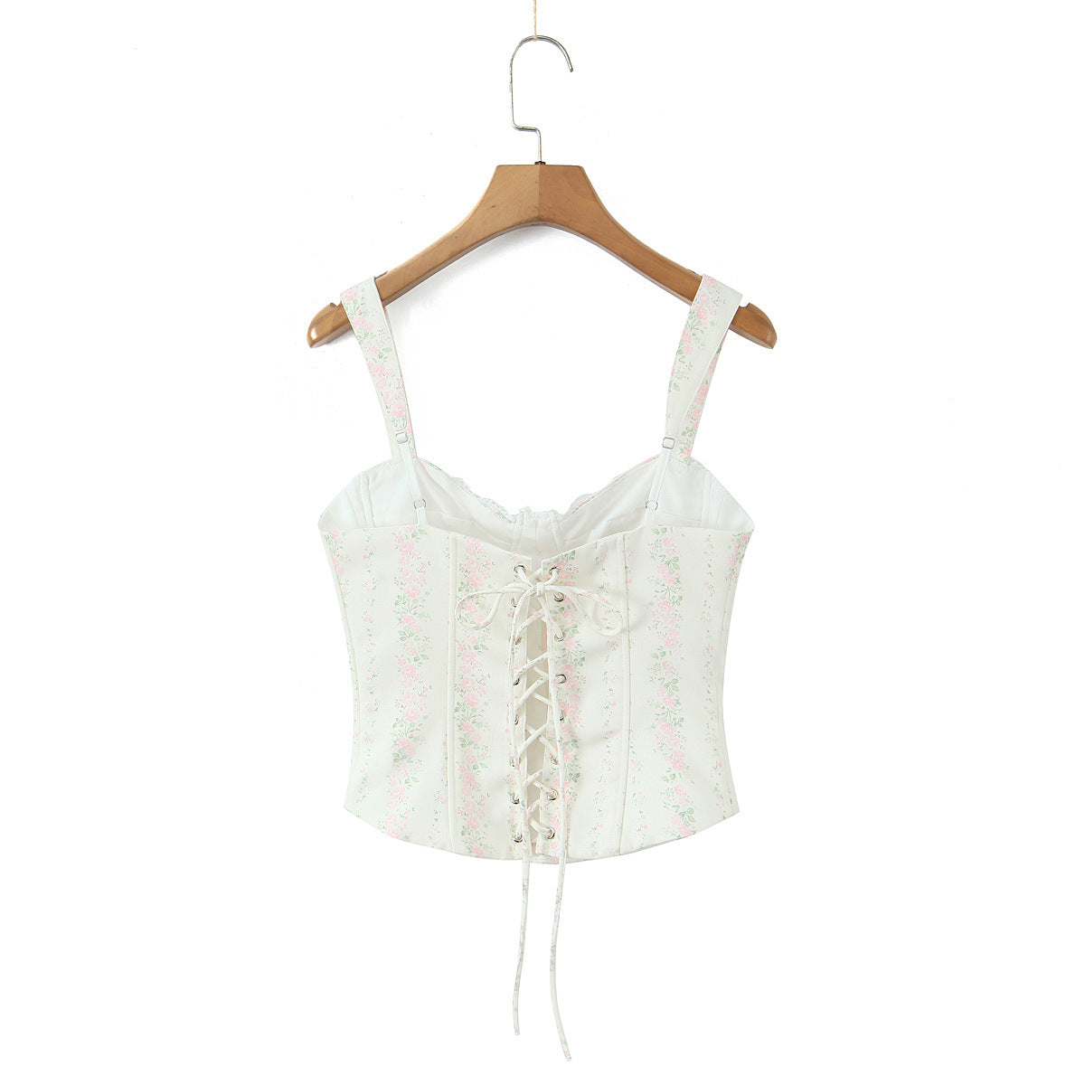 Back view of white floral print corset-style cami top with lace-up closure and adjustable fit
