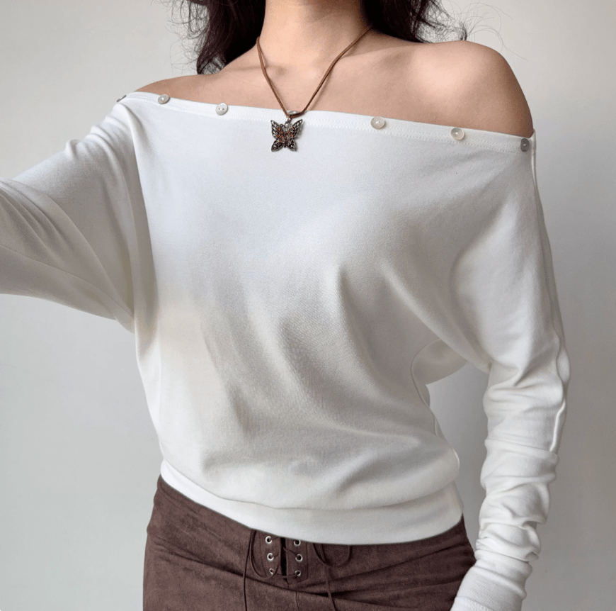 Close up front view white pearl trim off shoulder batwing long sleeve crop top, loose soft knit elegant casual vintage blouse