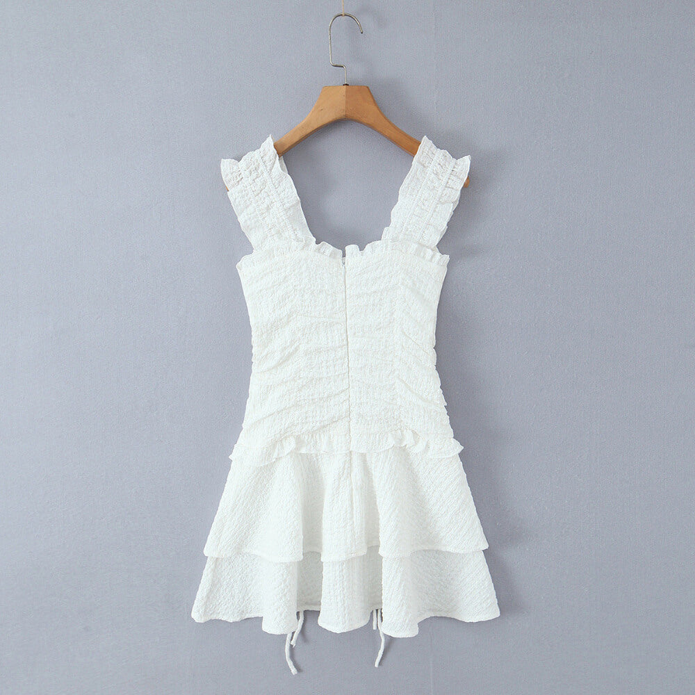 Back hanging view white textured ruffle-strap tiered mini dress with zipper closure, women's casual summer dress