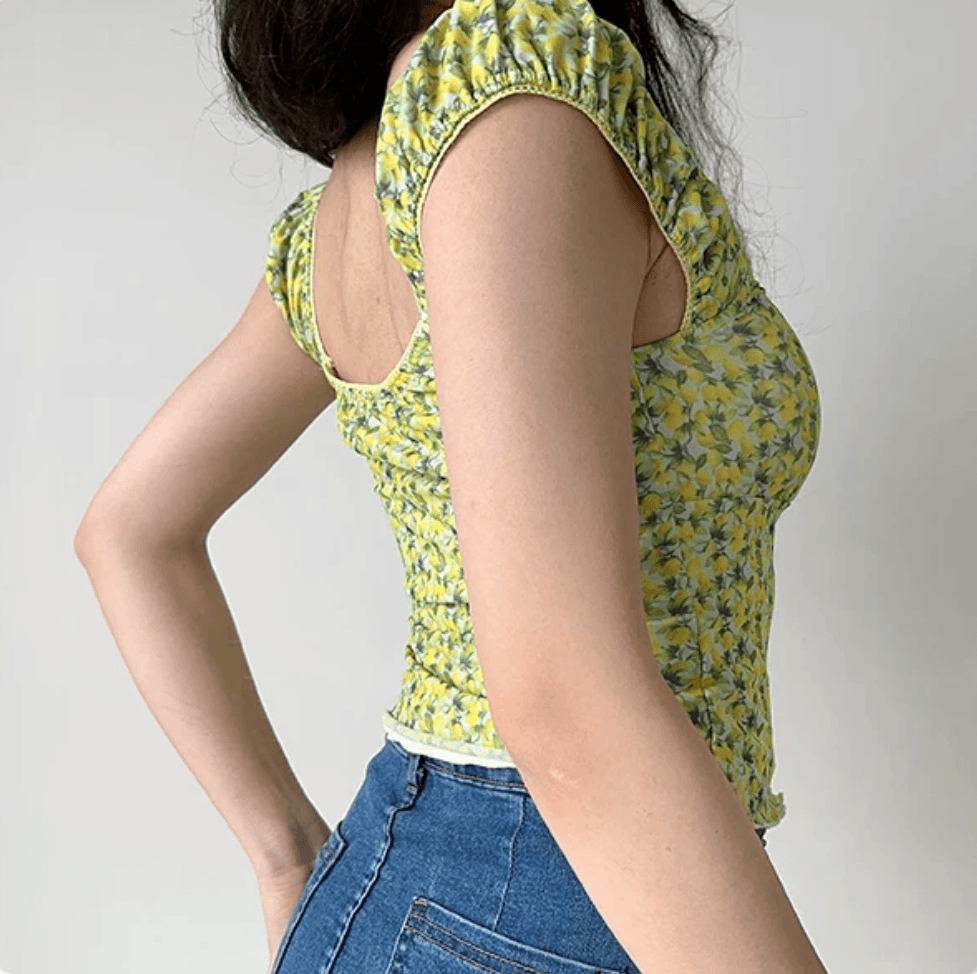 Side back view yellow green floral square neck puff sleeve crop top, tie front ruffle hem slim casual vintage fitted blouse