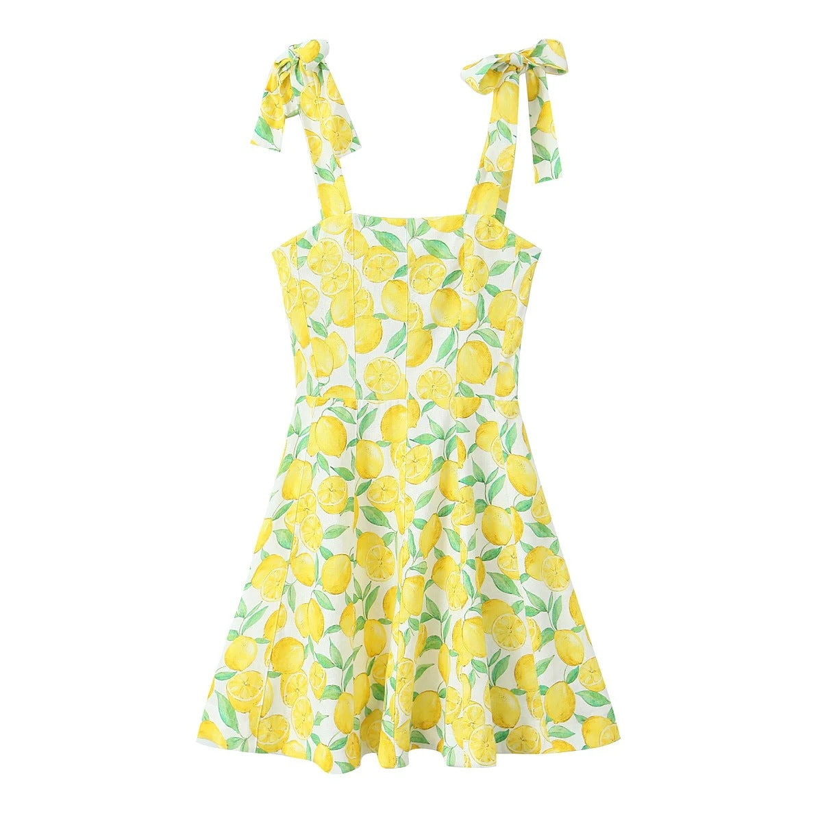 Front view of yellow lemon print cami mini dress with tie shoulder straps and A-line silhouette