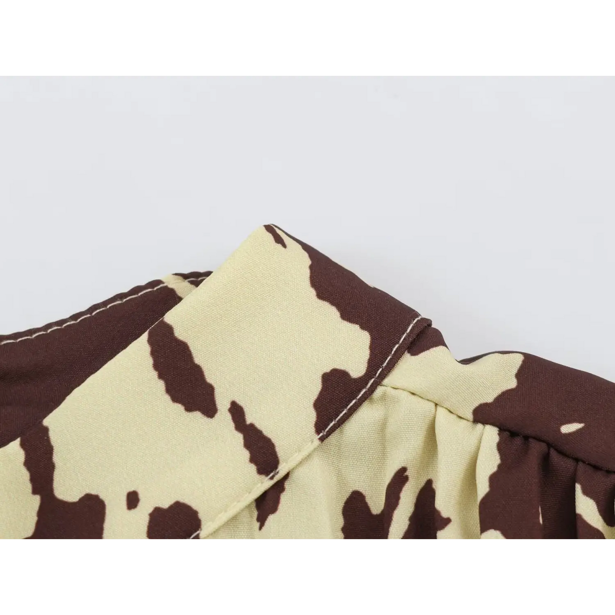 Close-up of high collar stitching detail