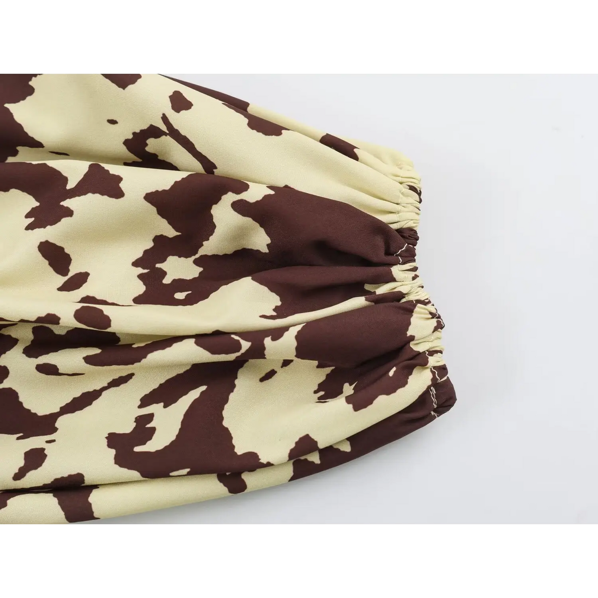 Close-up of elasticated puff sleeve cuff