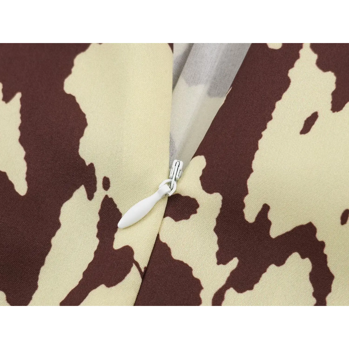 Close-up of back zipper pull detail