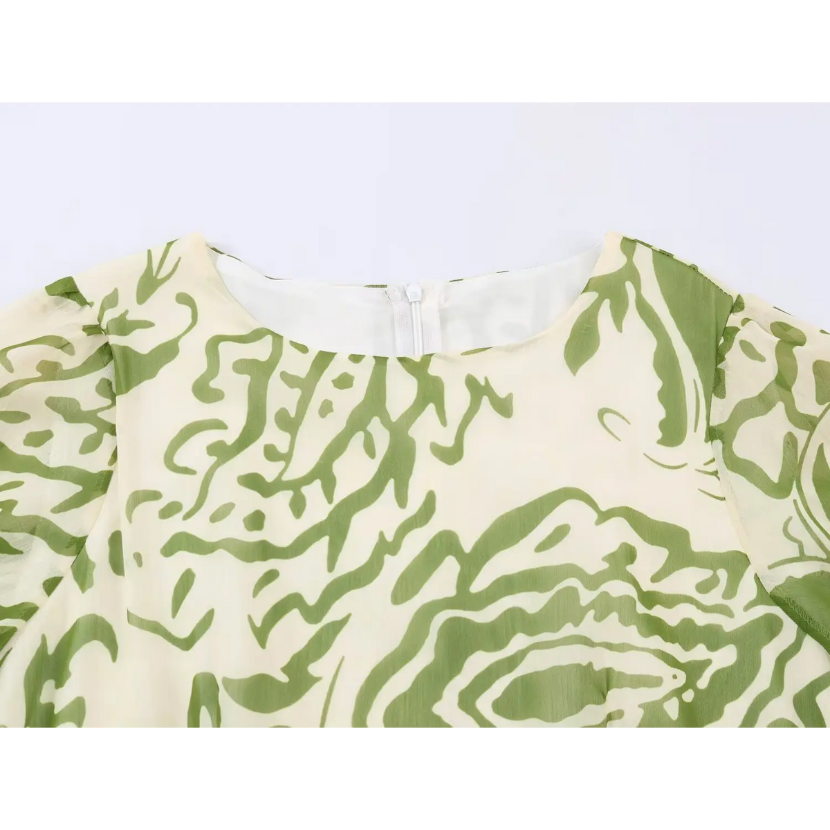 Close-up of round neckline and centre back zip