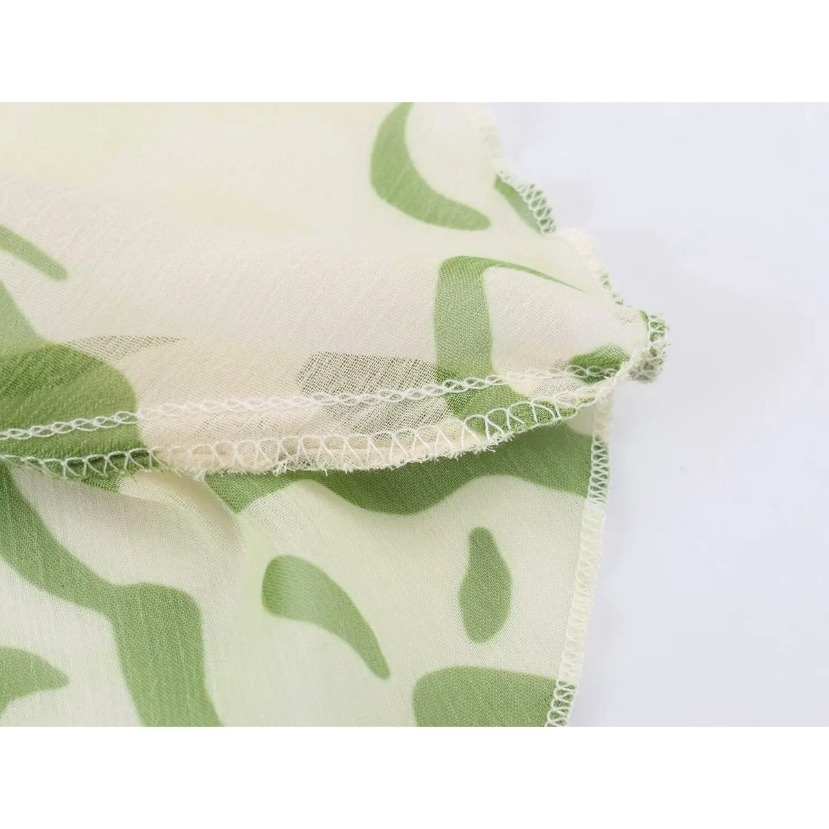 Close-up of overlocked ruffle hem stitching