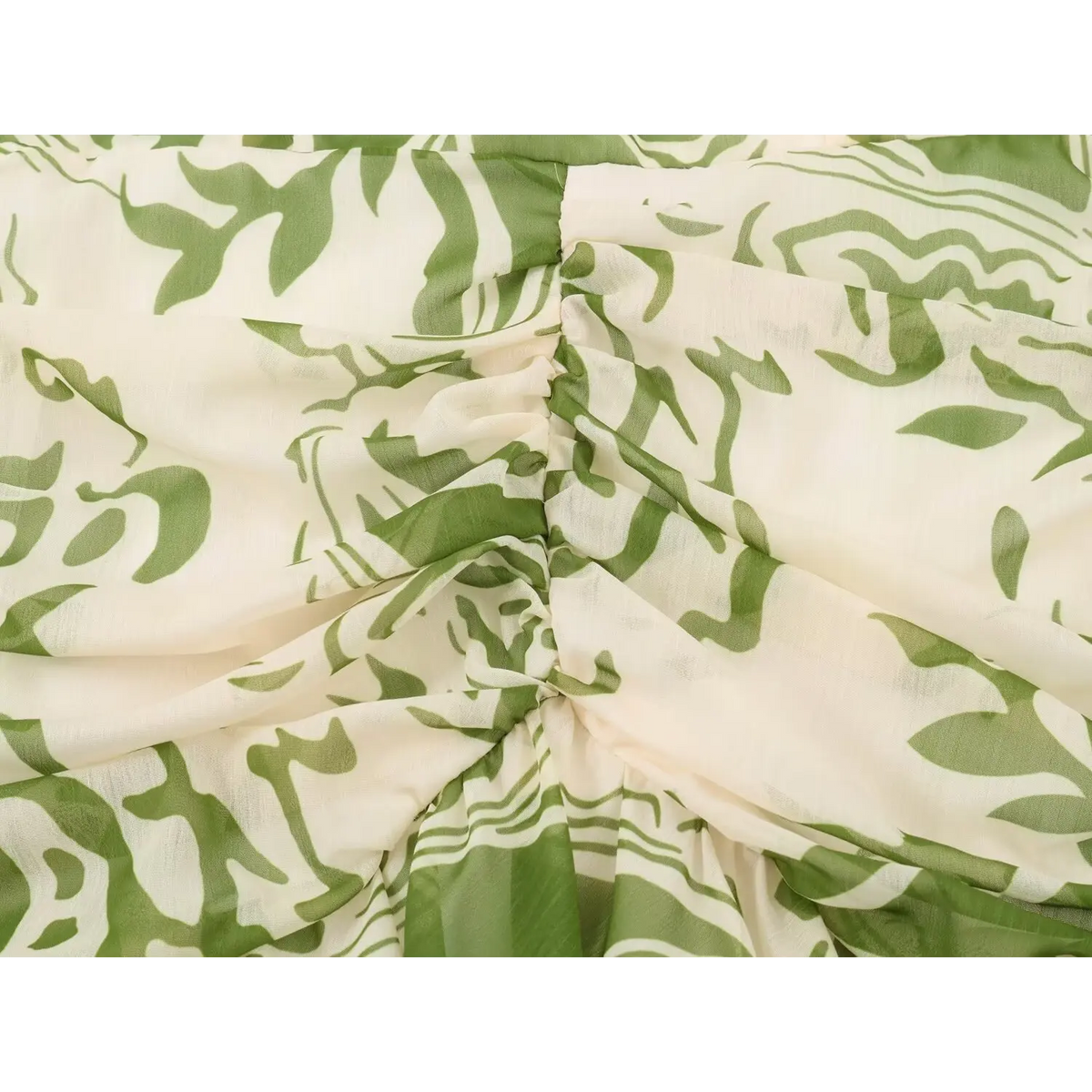 Close-up of ruched twist waist detail