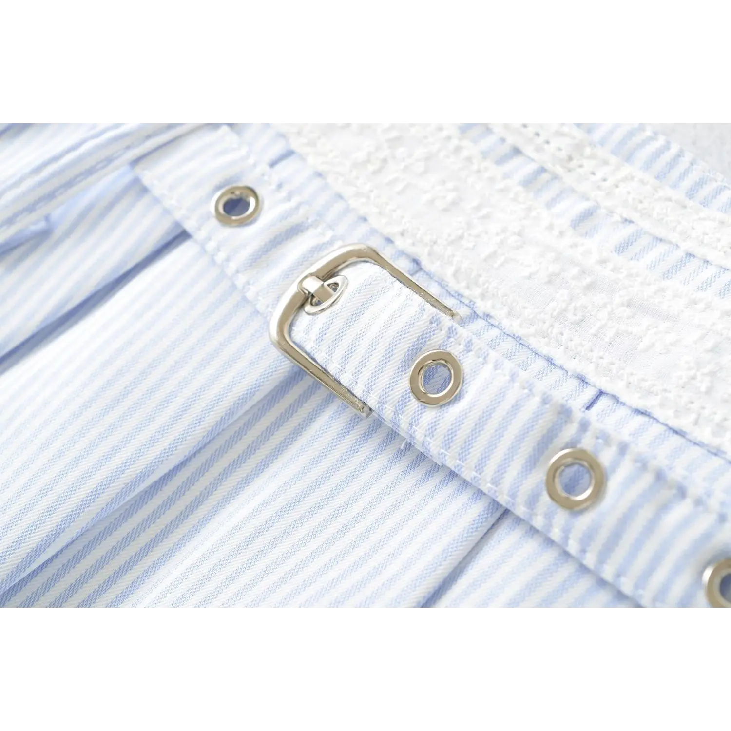 Adjustable D metal buckle waistband macro close-up, multi eyelets free waist size fit matching stripe woven tape neat binding stitching craft shot