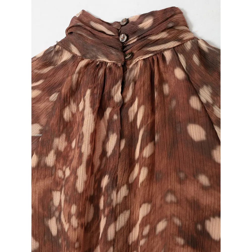 Close-up of back neck buttons and crinkled chiffon texture