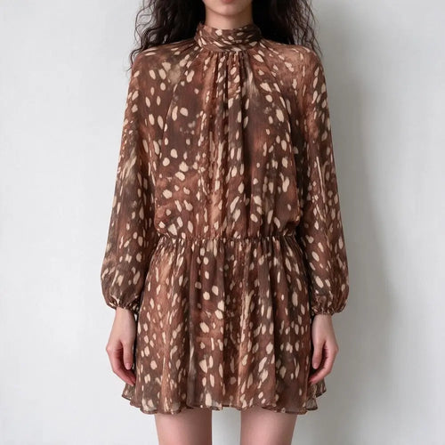 Model wearing brown animal print high neck puff sleeve mini dress, front view