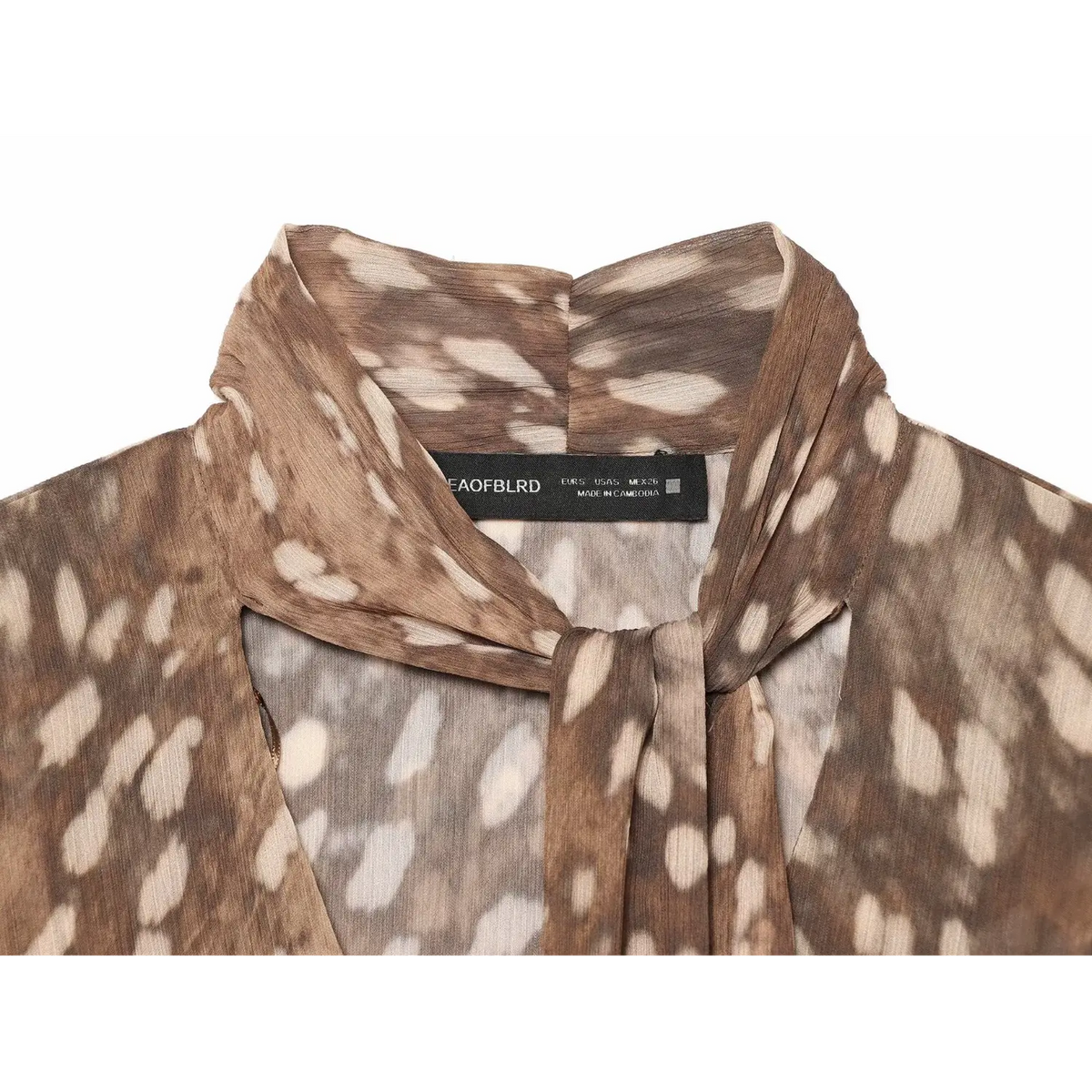 Close-up of neck label and tie detail