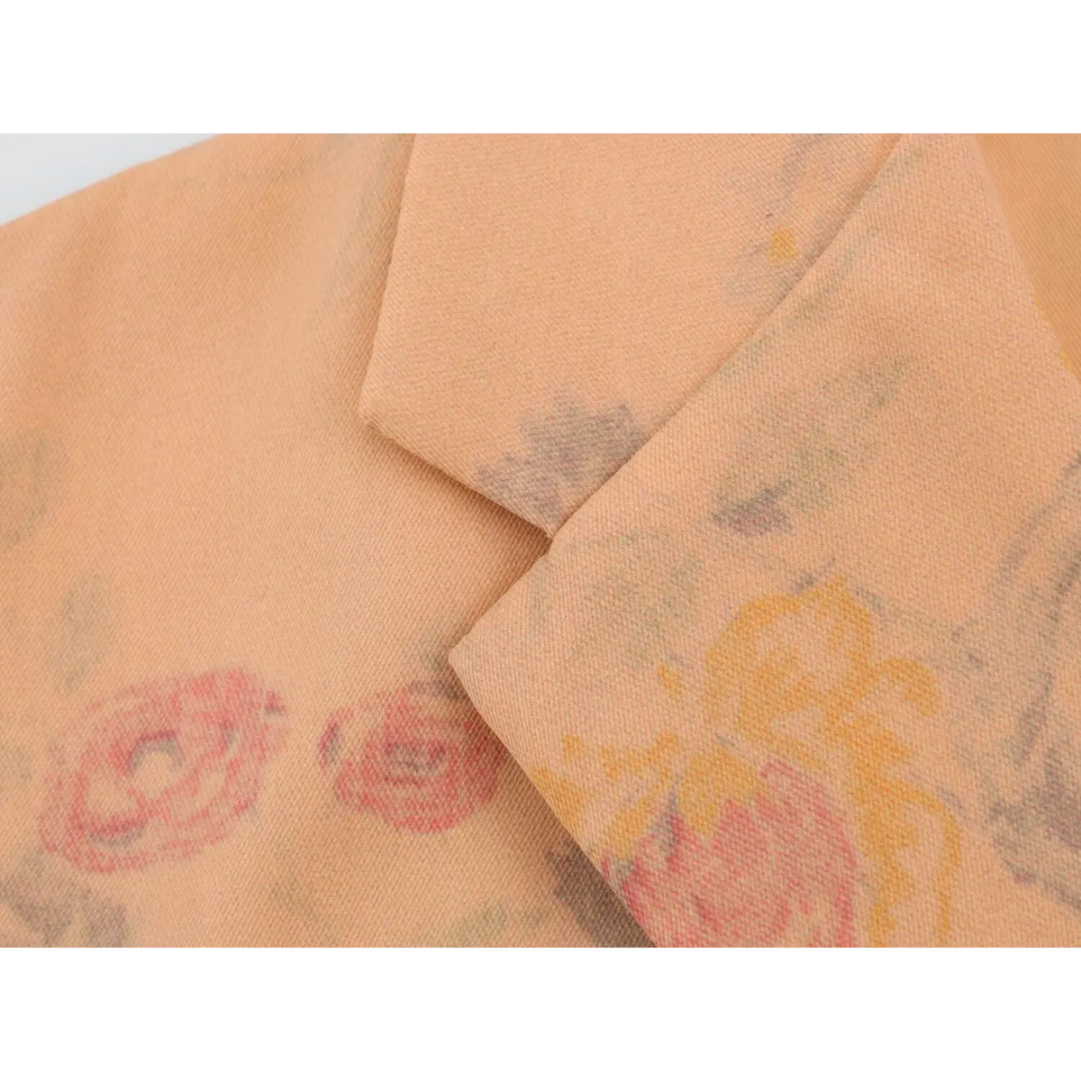 Close-up of watercolor floral print cotton twill fabric