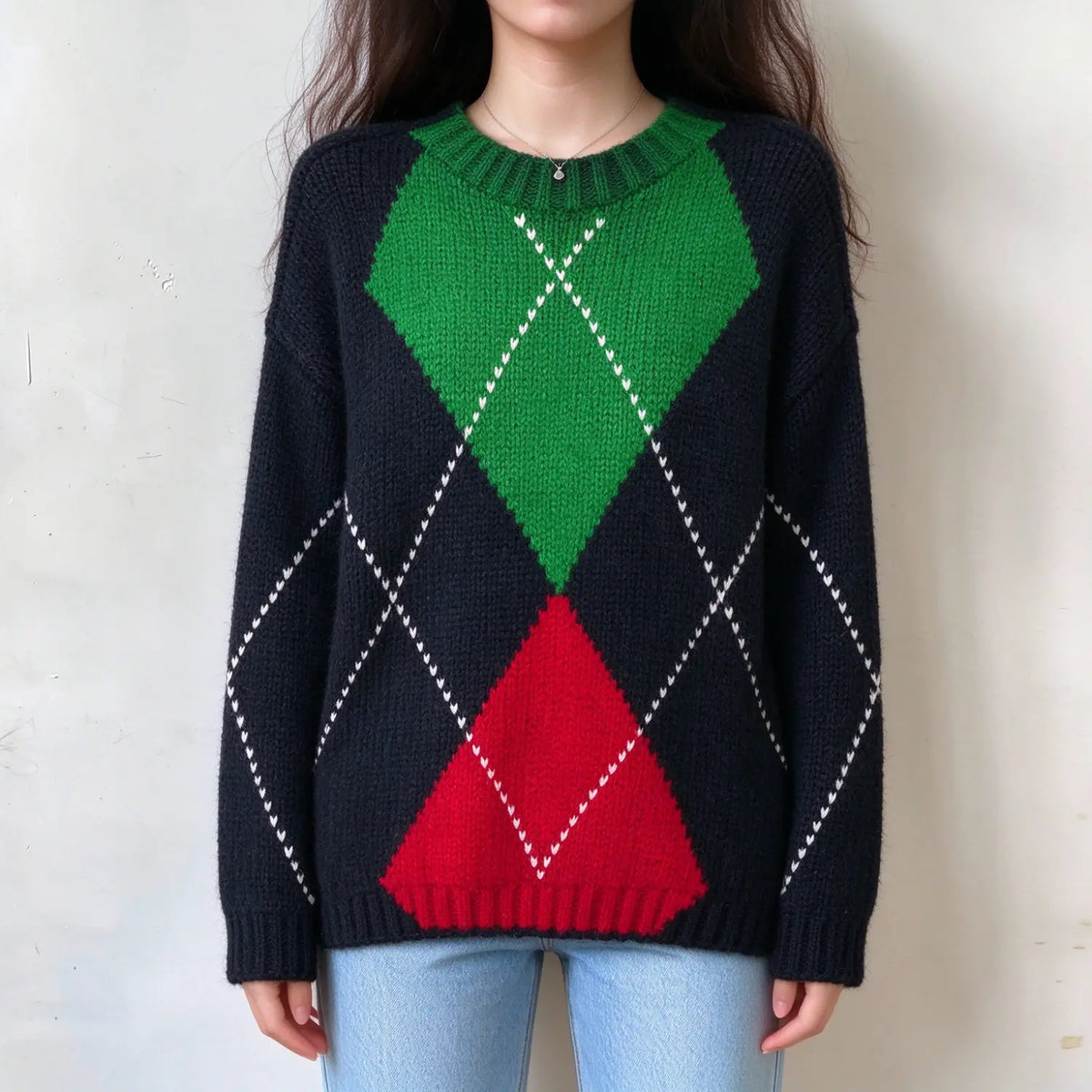 Model wearing argyle chunky knit crew neck sweater, front view
