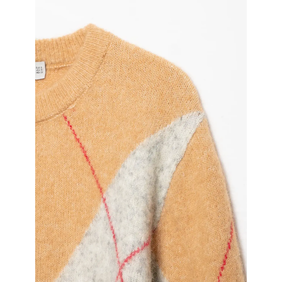 Close-up of light gray argyle diamond detail