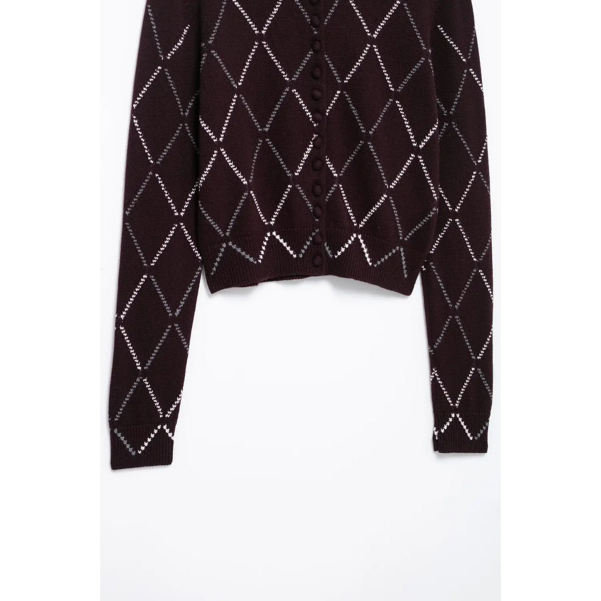 Close-up of ribbed hem and long sleeves