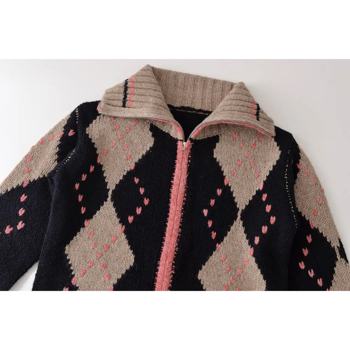 Close-up of ribbed collar and zip placket