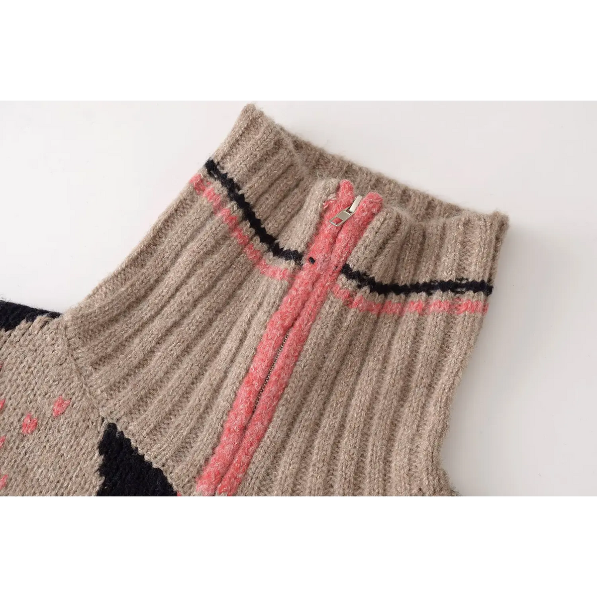 Close-up of ribbed collar and zipper pull