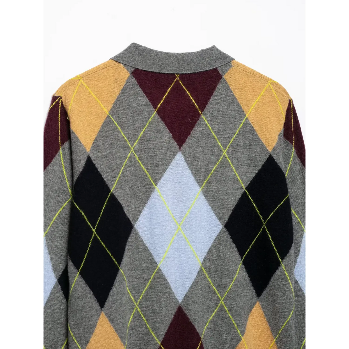 Close-up of argyle diamond pattern on back of grey knit sweater