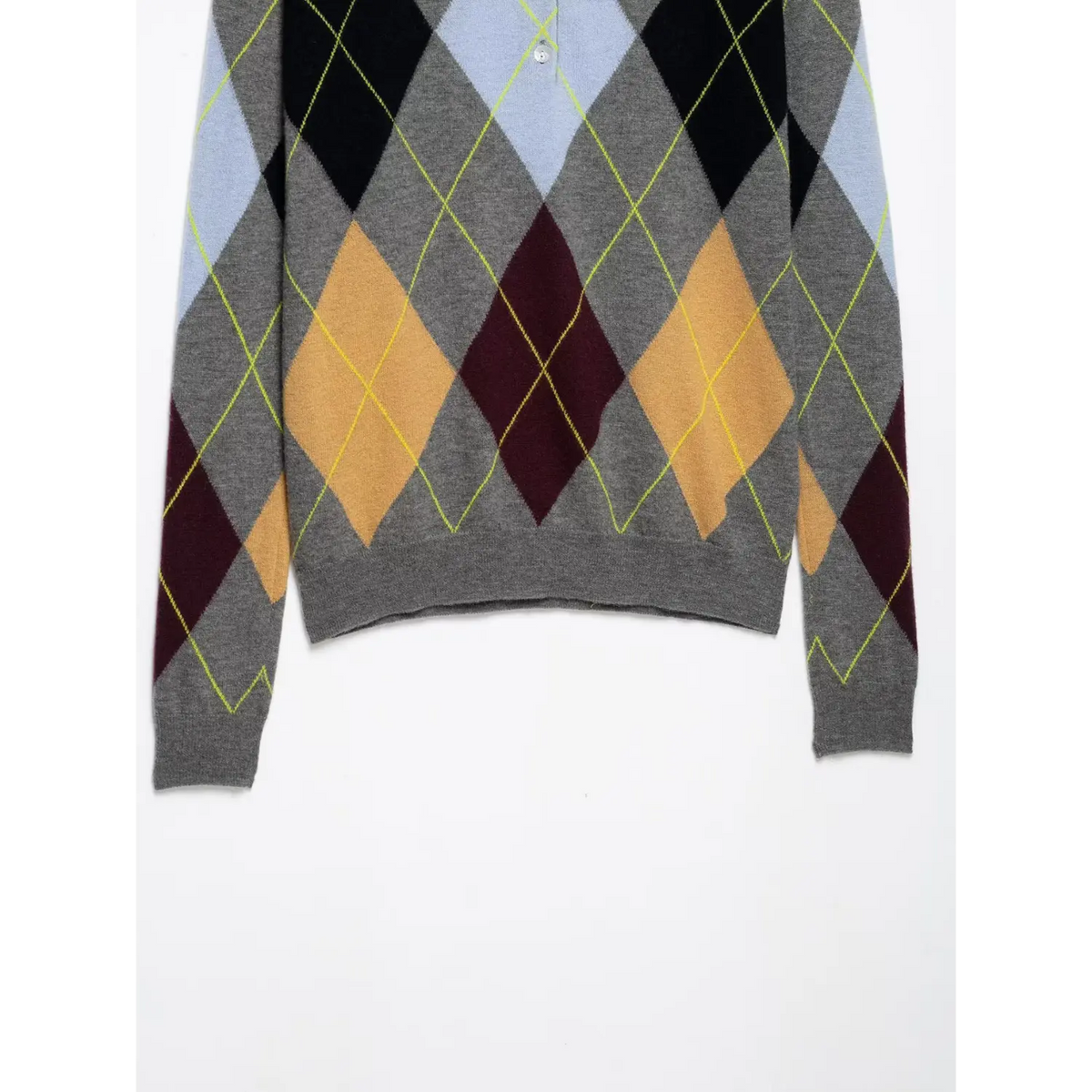 Close-up of button and diamond pattern in black, blue, wine and caramel on grey knit