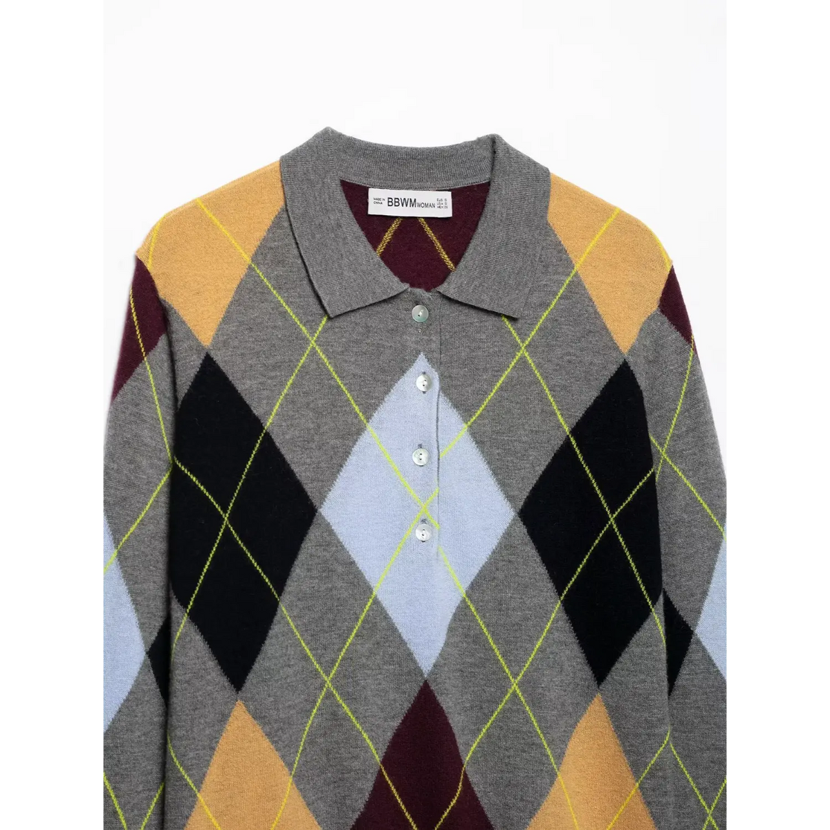 Close-up of placket with four round buttons on colorful argyle knit sweater