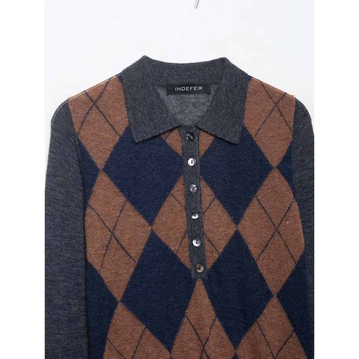 Close-up of polo collar and button placket