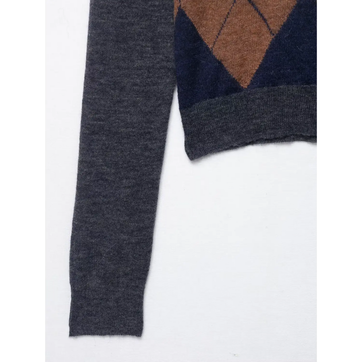 Close-up of sleeve cuff and hem