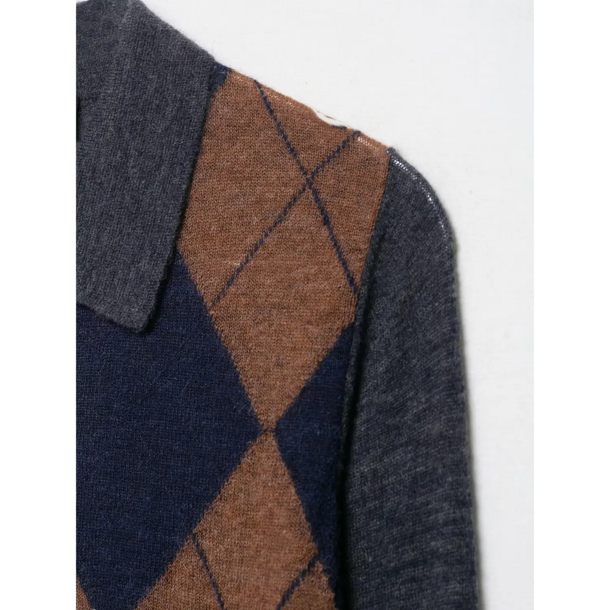 Close-up of argyle shoulder and collar