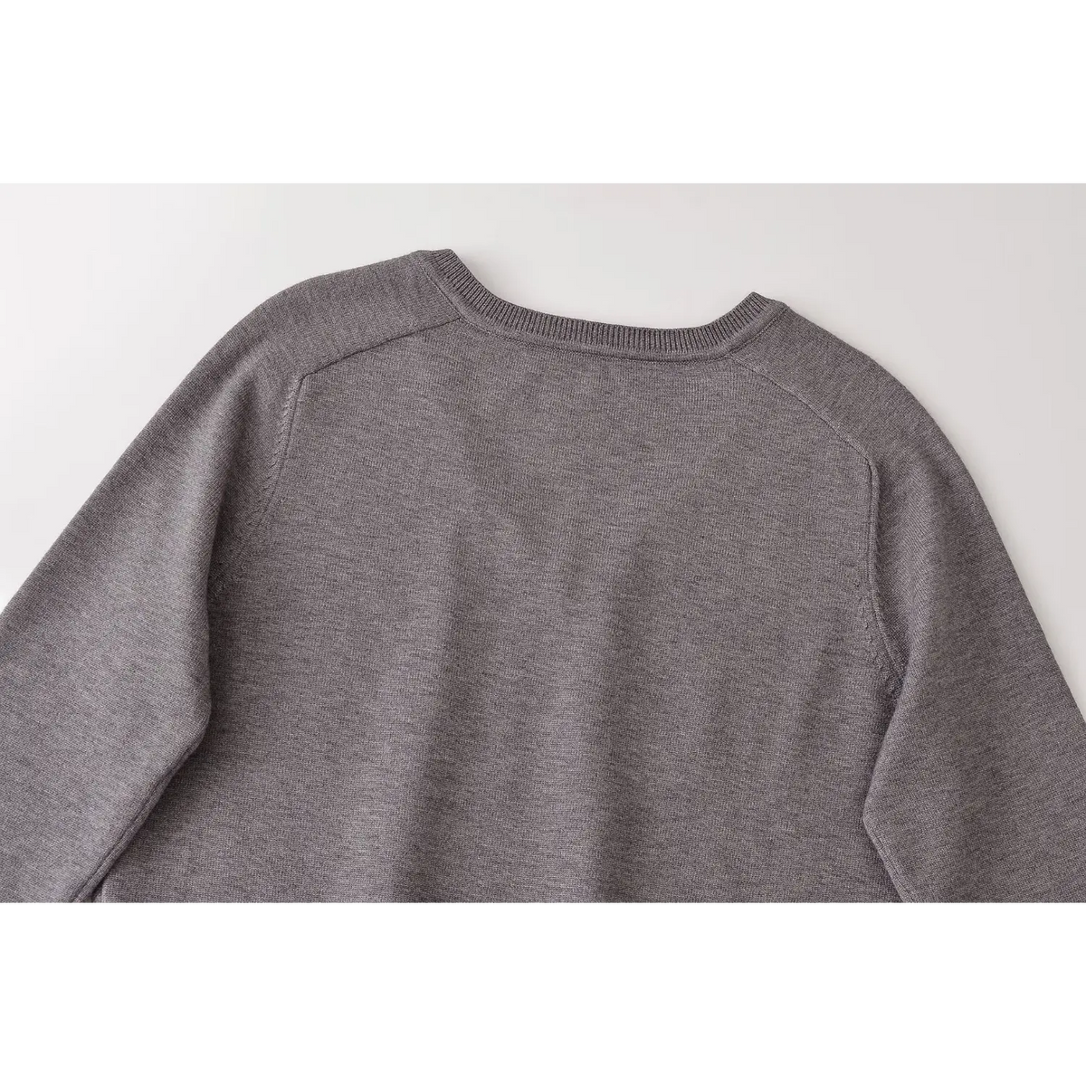 Close-up of back neckline and raglan shoulder seams