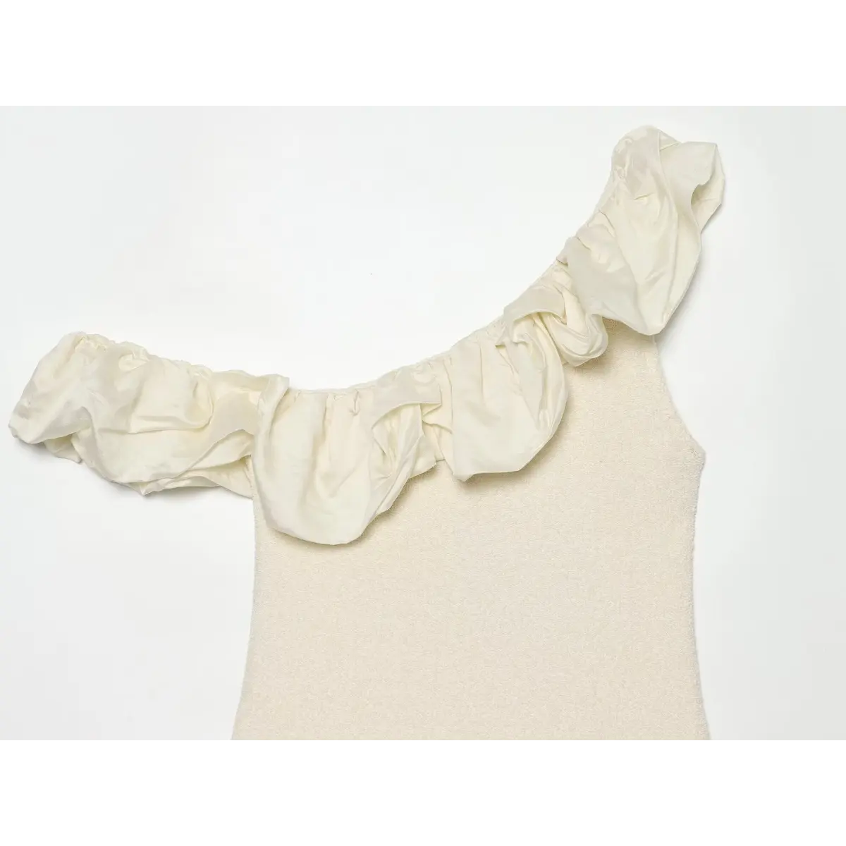 Full front hanging view cream one shoulder ruffle terry knit slim top