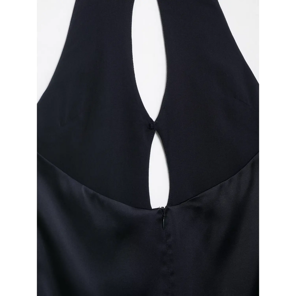 Close-up of back zipper and cutout on navy blue satin dress