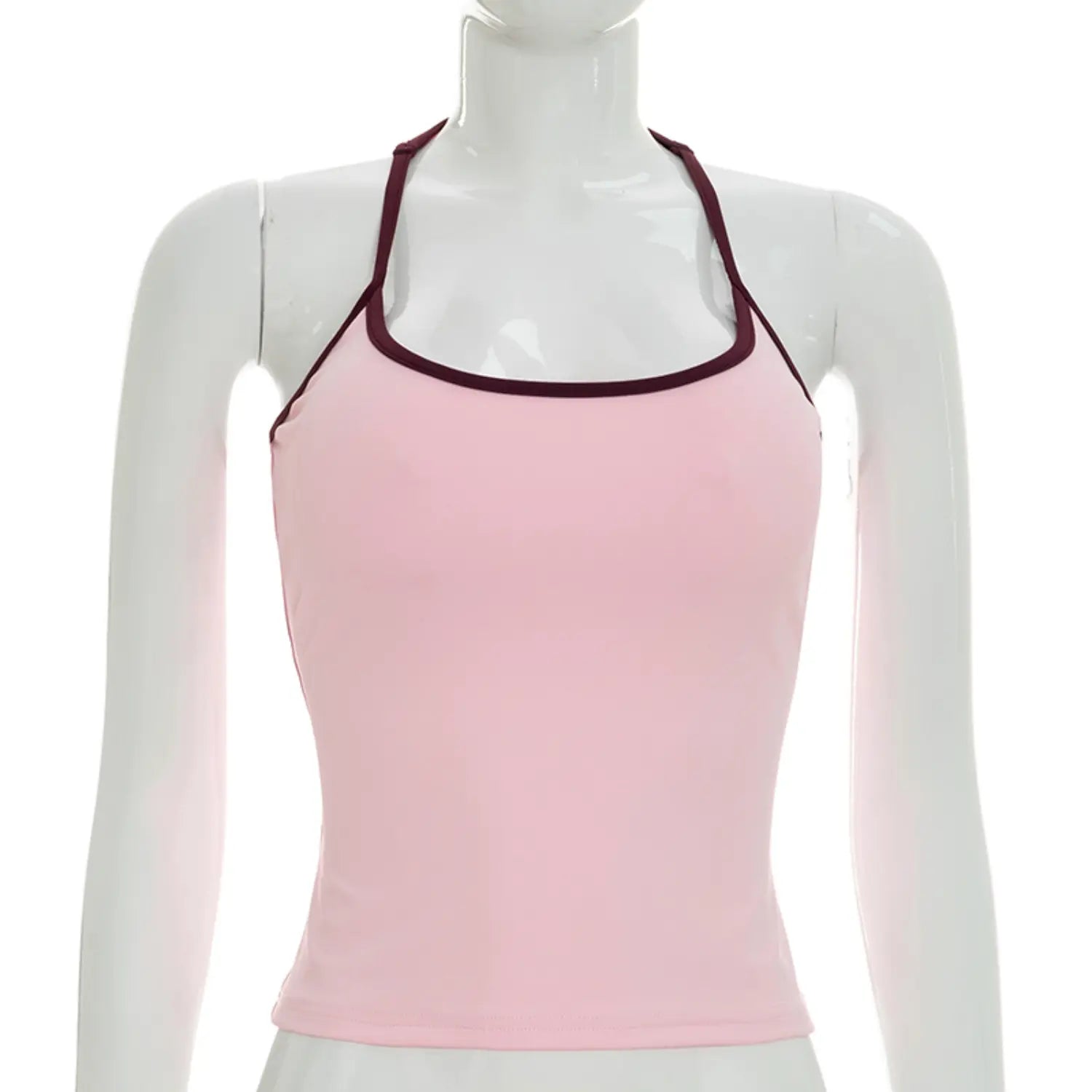 Full front white studio mannequin hero shot of halter racerback tank top, soft matte light pink stretch knit, rounded square neckline outlined with burgundy trim, slim cropped fitted silhouette, thin matching halter straps