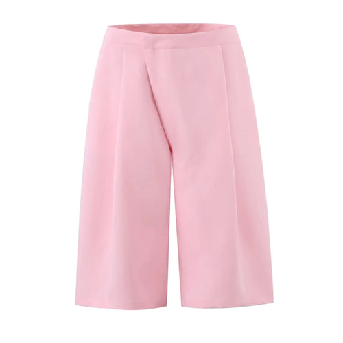 Full front flat lay of baby pink high waist midi pants, wrap front overlapping panel, wide leg silhouette, clean waistband, smooth woven suiting fabric