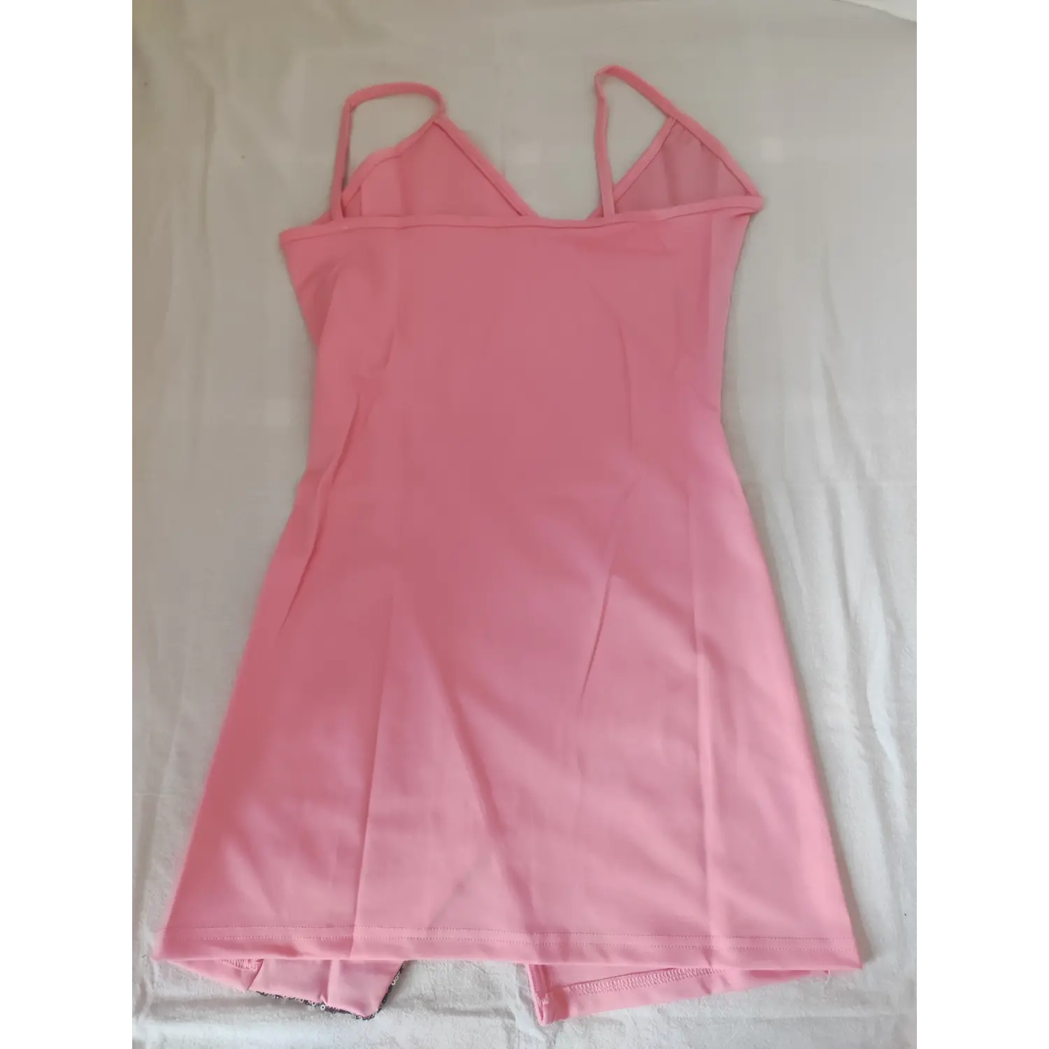 Flat back view pink slim spaghetti strap mini dress without sequin back panel