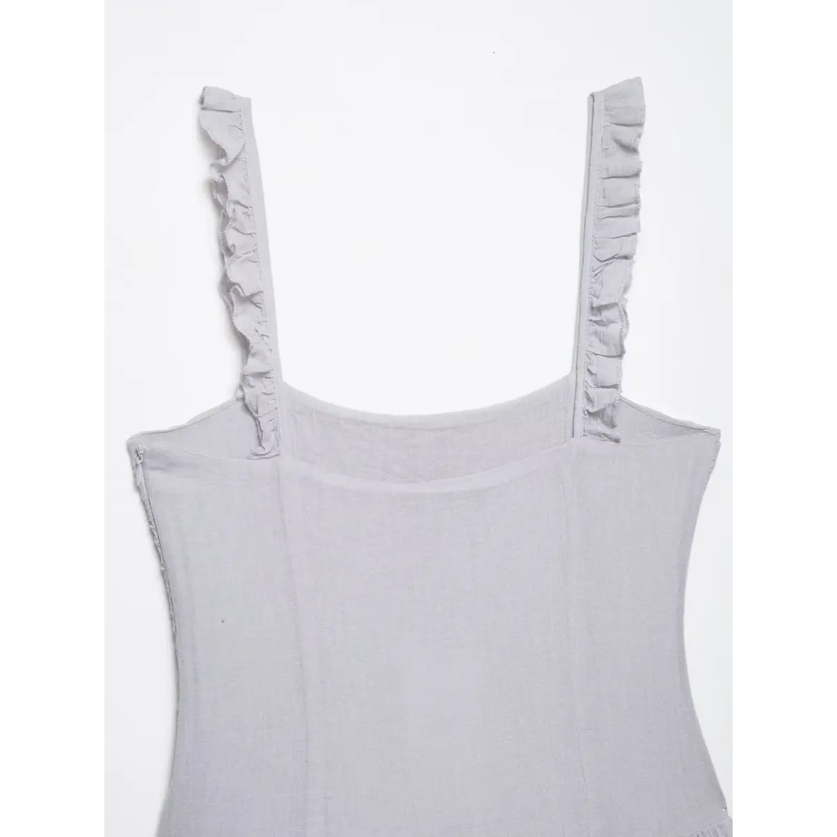 Back view of a gray cami dress, showing the side zipper closure and smooth back panel.