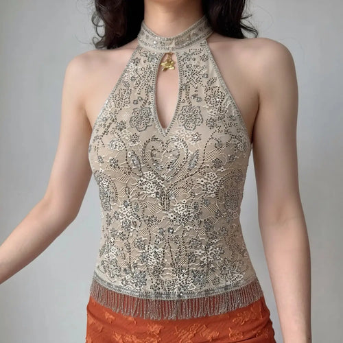 Model front wearing shot beige lace halter tank top with silver floral beading keyhole cutout and fringe hem