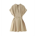 Flat lay front view beige stand collar mini dress with matching waist belt, batwing short sleeve, pleated skirt