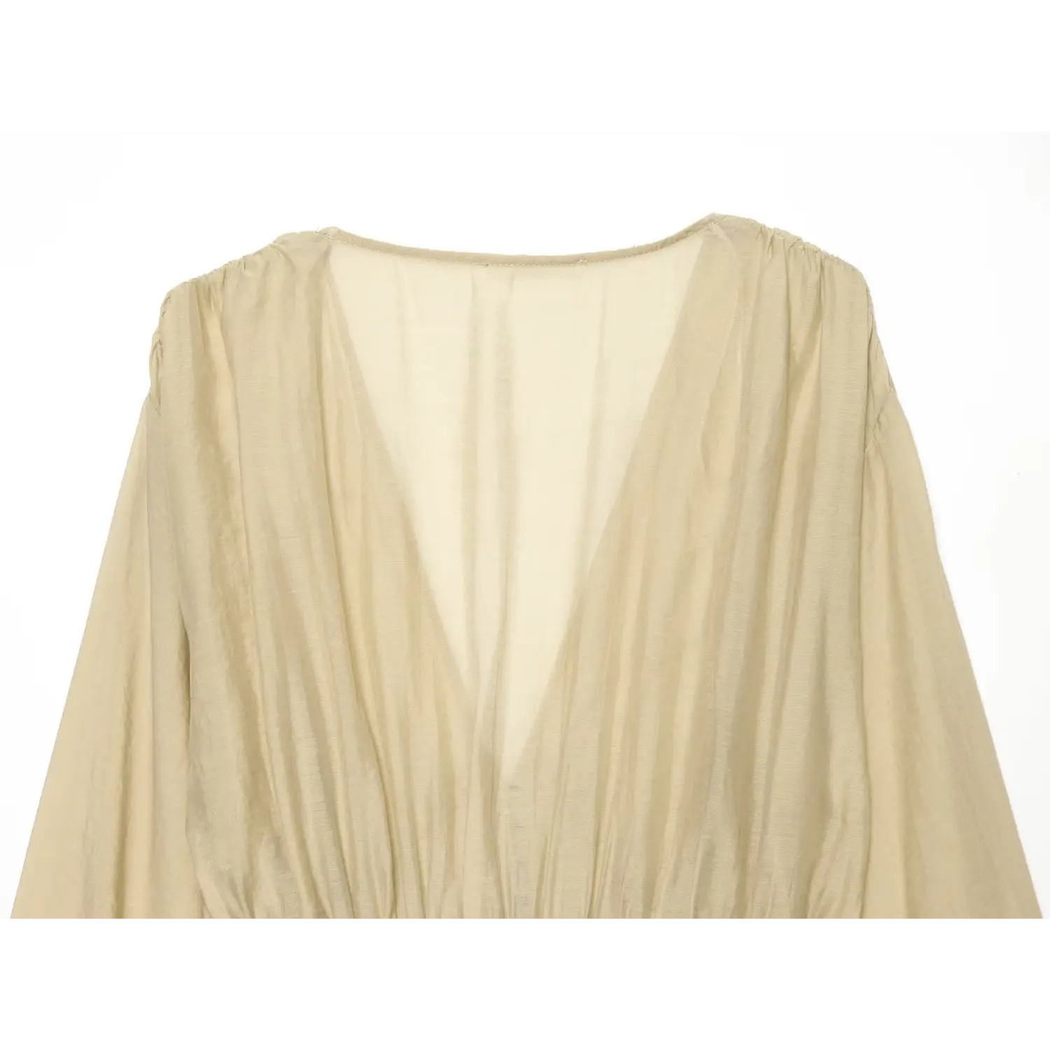 Close‑up back deep v‑neck gathered fabric of beige corset crop top