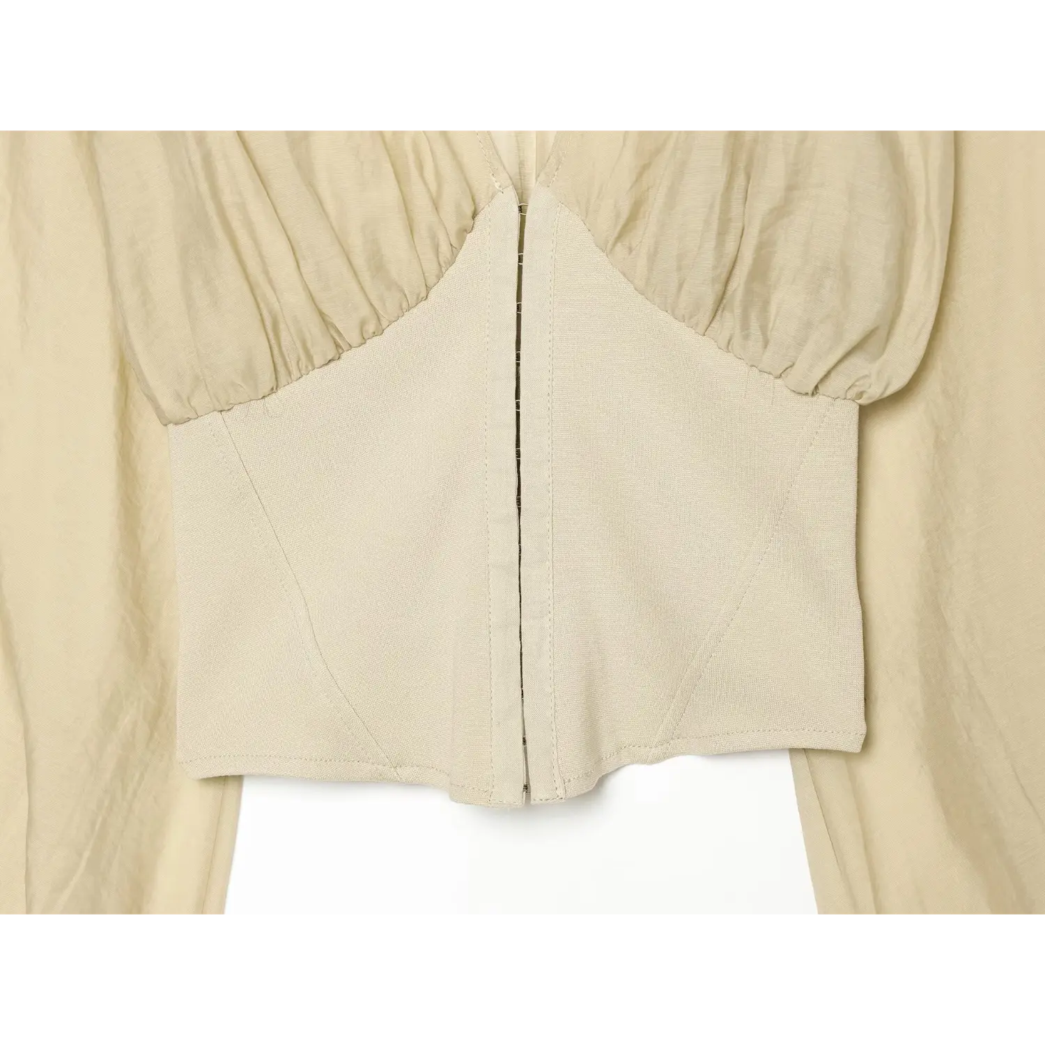 Close‑up front hook‑and‑eye closure and structured corset waist stitching detail