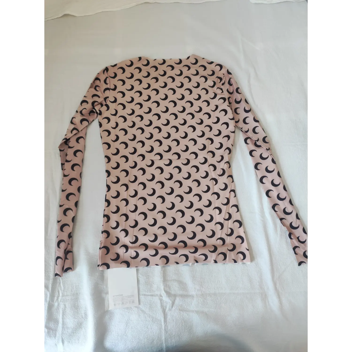 beige crescent moon print long sleeve top back flat lay | Detail